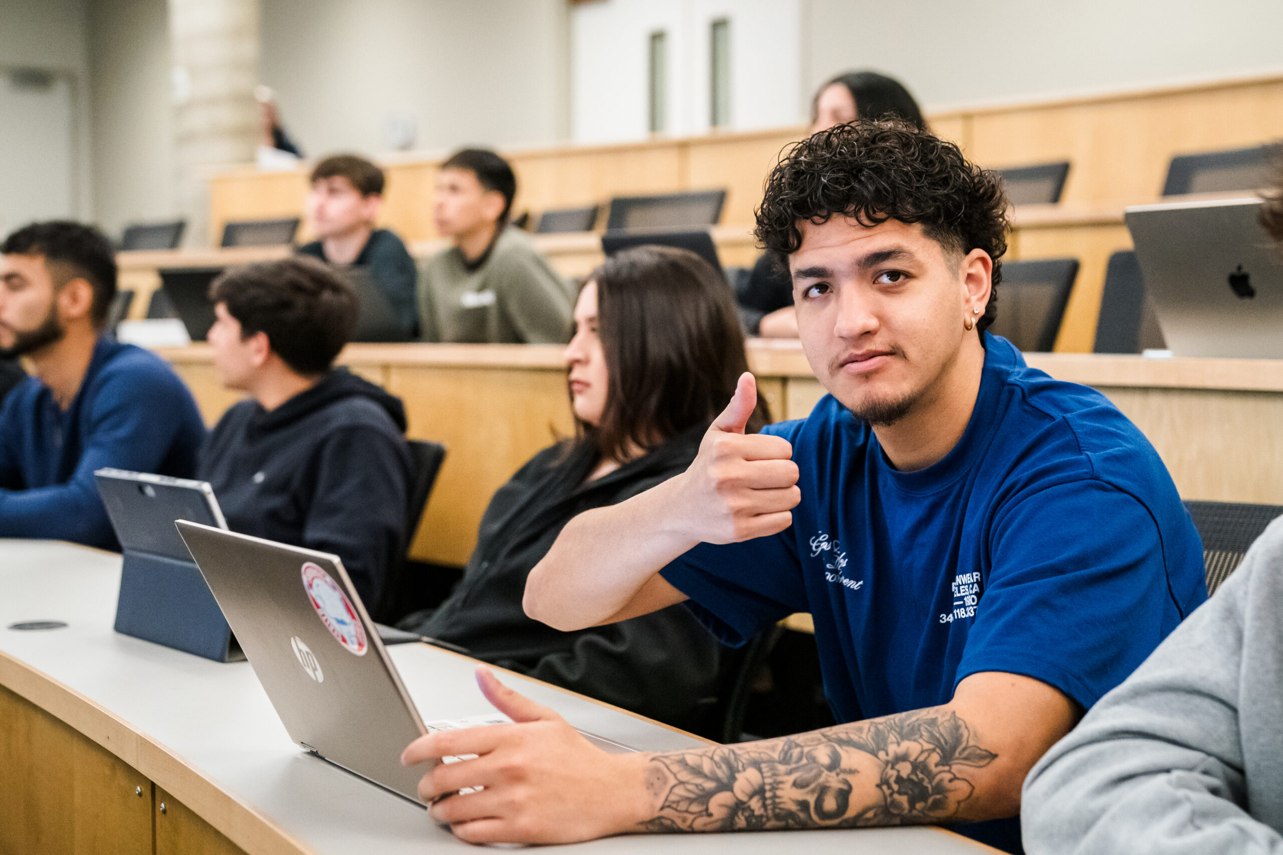 Students sitting in a teaching auditorium at Warner Pacific University.