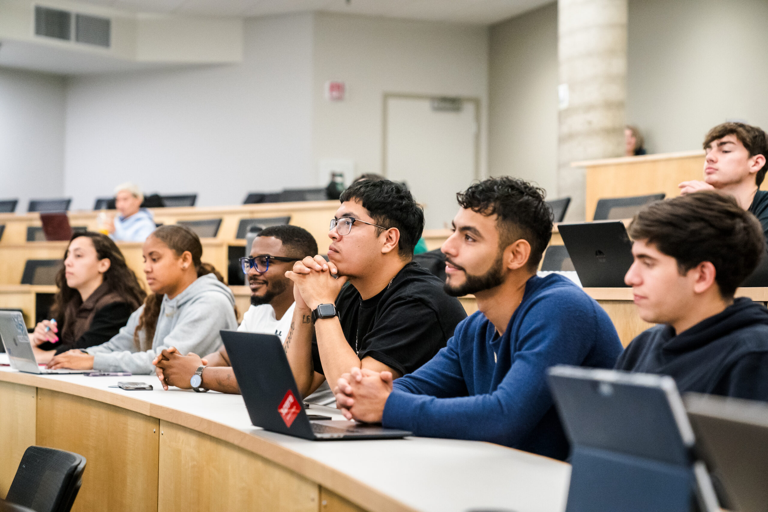 Students sitting in a row in a WPU classroom.