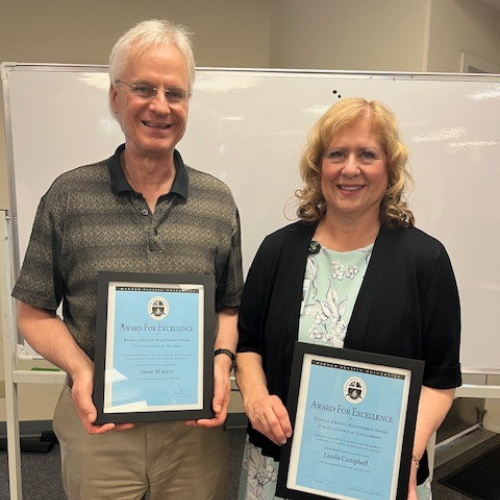 Dr. Steve Waters and Dr. Linda Campbell holding their 2025 Kendall Faculty Excellence Awards